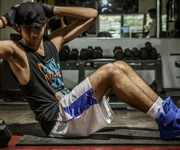 Man feeling energetic and strong after a workout session.